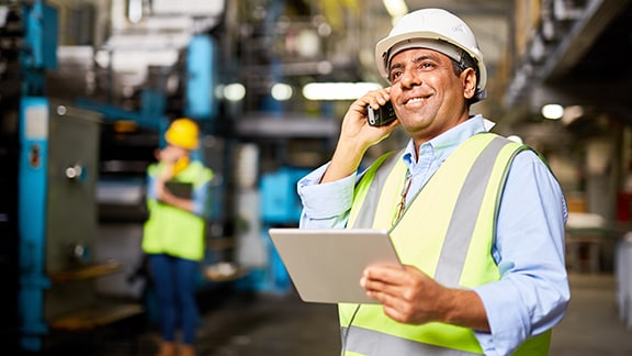 Contractor safety gear speaking phone